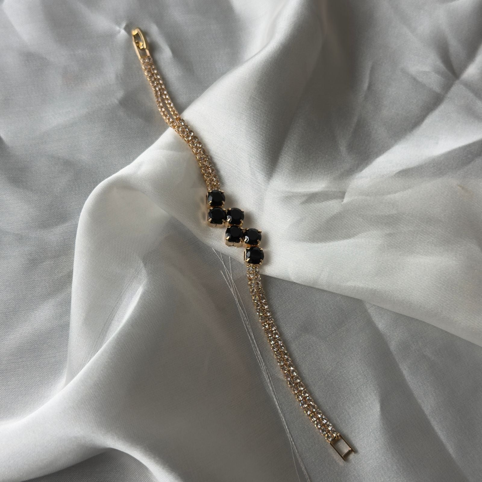 Clover Style Gold Toned Bracelet with Black Stones